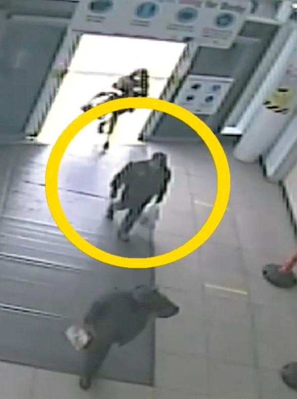 Clarke entering the bus station. 