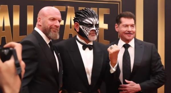 WWE owner Vince McMahon reveals dramatic new moustache and get black hair in first official appearance since return