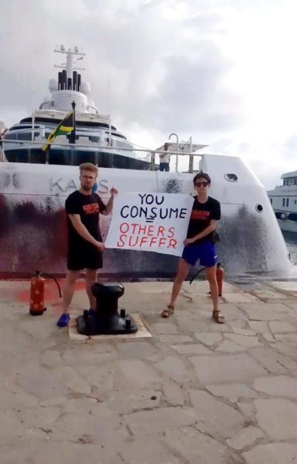 Protesters demo<em></em>nstrate in front of a super yacht belo<em></em>nging to Walmart heir Nancy Walton Laurie after spray paining it in Ibiza, Spain on July 16, 2023.