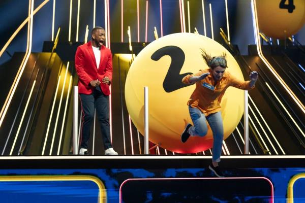 Jay Pharoah watching a ball knock a co<em></em>ntestant into water on 