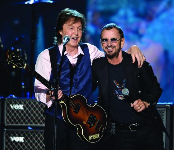 Paul McCartney and Ringo Starr perform