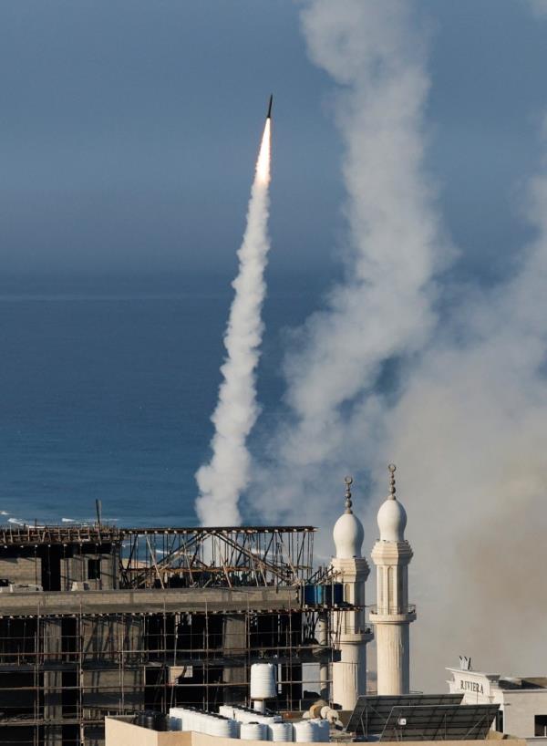 Rockets are fired by Palestinian militants into Israel early Saturday.