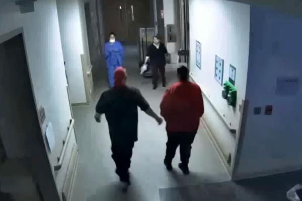 Nurses rush to the trash.
