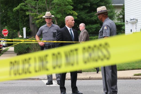 Police and investigators at a crime scene