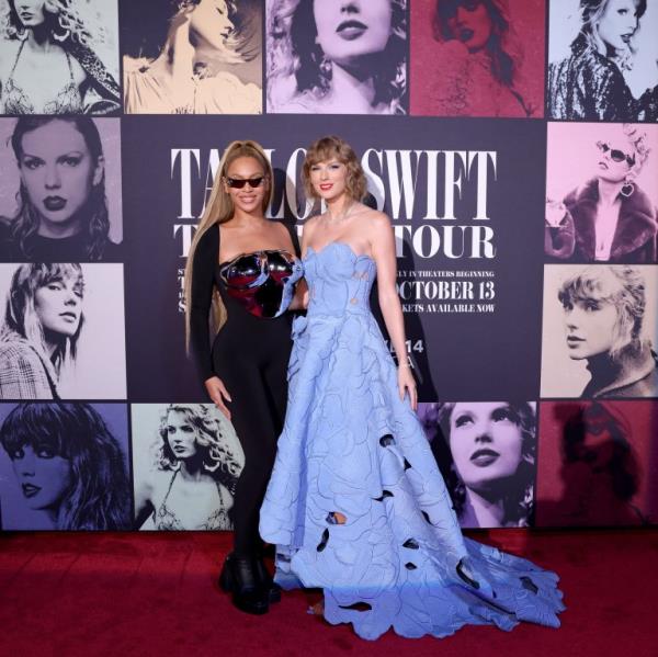 Taylor and 42-year-old Beyoncé both beamed while posing together on a red carpet (Picture: Getty)