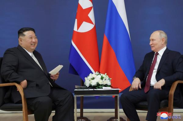 North Korean leader Kim Jong Un, left, and Russian President Vladimir Putin talk at the Vostochny cosmodrome outside the city of Tsiolkovsky in the far eastern Amur region, Russia, on Sep. 13, 2023. 