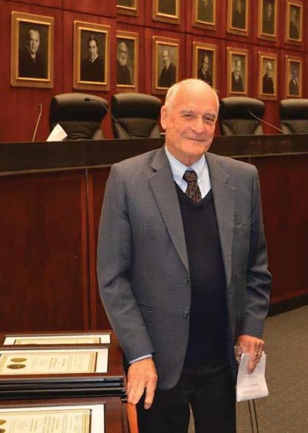 Judge Robert Gettleman is pictured in a headshot.