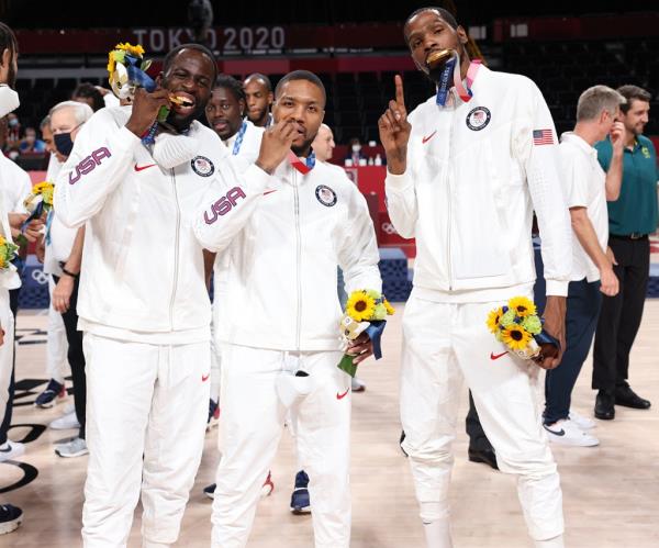 Draymond Green #14, Damian Lillard #6 and Kevin Durant #7 of the USA Men's Natio<em></em>nal Team pose for a picture during the Medal Ceremony of the 2020 Tokyo Olympics at the Saitama Super Arena on August 7, 2021 in Tokyo, Japan. 