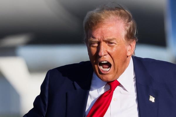 Republican presidential candidate and former U.S. President Do<em></em>nald Trump shouts during a campaign event in Freeland, Michigan, U.S. May 1, 2024.  