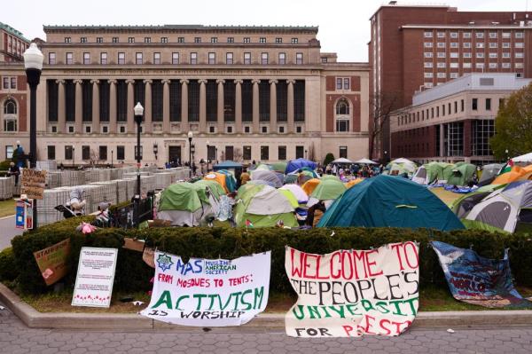People gather at a pro-Palestinian encampment on the lawn of Columbia University  on Saturday, April 27, 2024.