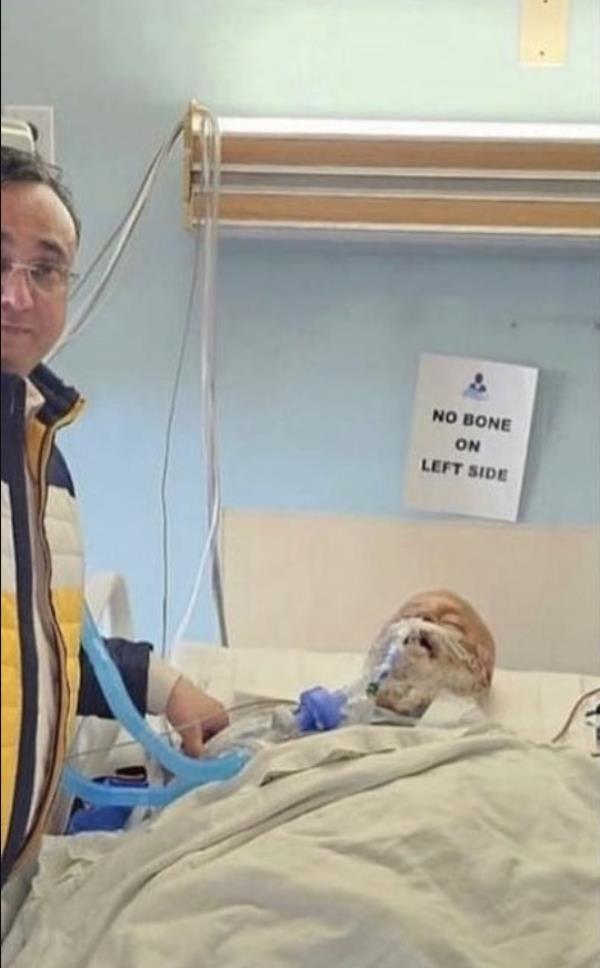 Jasmer Singh, 66, seen gravely wounded in his hospital bed,