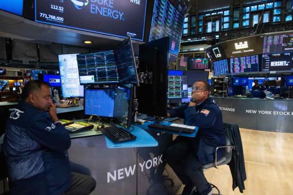 traders work on the trading floor of the New York Stock Exchange (NYSE) in New York, the United States, on Aug. 5, 2024. 
