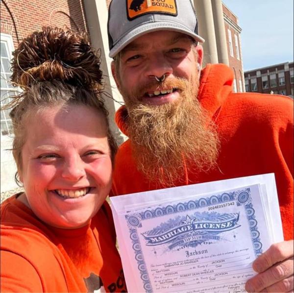 Kansas City Chiefs fans Bob and Sami Whyldgrr got married at parade just before the deadly shooting.