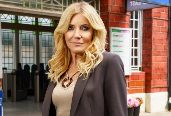 Promo photo of Cindy Beale in front of the tube station in EastEnders, as new Cindy affair is '////con<em></em>firm/i/i/i/ied'