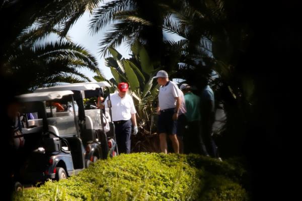 U.S. President Do<em></em>nald Trump plays golf at the Trump Internatio<em></em>nal Golf Club in West Palm Beach, Florida, U.S., December 27, 2020. 