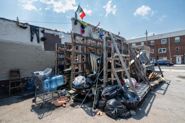 A picture showing the debris pile that existed o<em></em>nly a week ago.