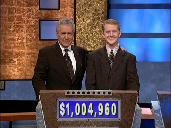 Alex Trebek, (L) poses with then co<em></em>ntestant Ken Jennings after his earnings from his record breaking streak on the gameshow surpassed 1 million dollars July 14, 2004 in Culver City, California. 
