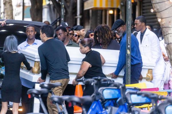 Family members carry 11 year-old Cayden Thompson's casket during this funeral at Peter Jarema Funeral Home on Friday, September 20, 2024