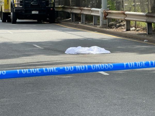 The gory remains were seen covered by a single sheet.