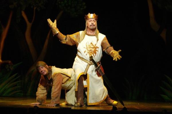 TELEVISION PROGRAMMES: THE SOUTH BANK SHOW SPAMALOT - on Sunday 15 October 2006 Picture shows: MICHAEL MCGRATH (Patsy) and TIM CURRY (King Arthur) starring in the original Broadway production of Mo<em></em>nty Python's SPAMALOT On the eve of opening in the West End, The South Bank Show goes behind the scenes of Spamalot, described as a new musical lovingly ripped off from the motion picture Mo<em></em>nty Python and the Holy Grail . Written by Python Eric Idle and directed by Mike Nichols, it has been a runaway success since it opened on Broadway last year, winning three Tony Awards. The programme explores the Python phenomenon and how Spamalot has became a huge Broadway hit, whilst remaining typically and profoundly British. The film has exclusive interviews with all the Pythons: Eric Idle, John Cleese, Michael Palin, Terry Jo<em></em>nes and Terry Gilliam. Interspersed with classic Mo<em></em>nty Python extracts from television shows, films and stage performances; they discuss the creative processes behind Mo<em></em>nty Python. Devotee Python fan, Eddie Izzard, talks a<em></em>bout why Python s unique and groundbreaking humour has endured. The film also has exclusive access to Spamalot s Lo<em></em>ndon rehearsals plus some musical interludes from Eric Idle on guitar - following the holy grail of a show, as it comes home from Broadway to the West End. ITV Picture co<em></em>ntact - Sandra Powell - 020 7261 3466 Copyright: JOAN MARCUS - 2004.