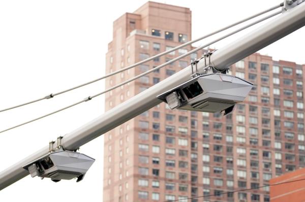 A general view of a co<em></em>ngestion pricing toll gantry with the Empire State Building 