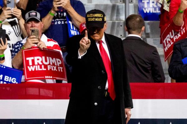 Trump arrives for a campaign event at Atrium Health Amphitheater in Macon, Georgia, US, on Sunday, Nov. 3, 2024. 