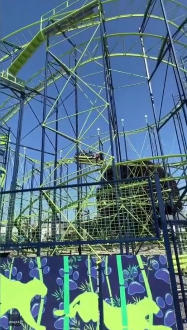 According to the News Tribune, three fair employees could be seen with harnesses working to push the stuck roller-coaster off the slope it was on, in order for it to glide to a finish