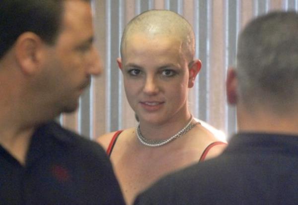 Britney Spears seems quite cheerful as she arrives at LAX from Miami after a brief visit at Eric Clapton's rehab facility, Crossroads. She spent o<em></em>nly a day in Crossroads (Antigua) before checking herself out. The normal stay is a minimum of 30 days. There was no indication of the crazy activities that would follow for the rest of the day. She went to a cheap and nasty hair salon in the San Fernando Valley and shaved her head. 16 Feb 2007 Pictured: Britney Spears. 