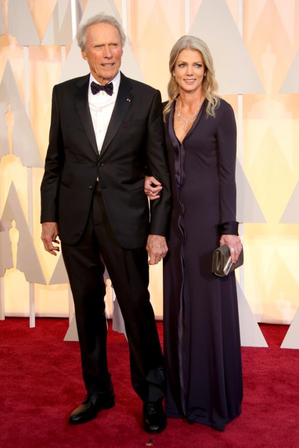 Clint Eastwood and Christina Sandera at the 87th Academy Awards in 2015.