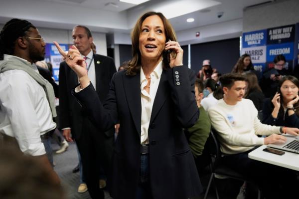 Democratic presidential nominee Vice President Kamala Harris phone banks with volunteers at the DNC headquarters on Election Day, Tuesday, Nov. 5, 2024, in Washington.