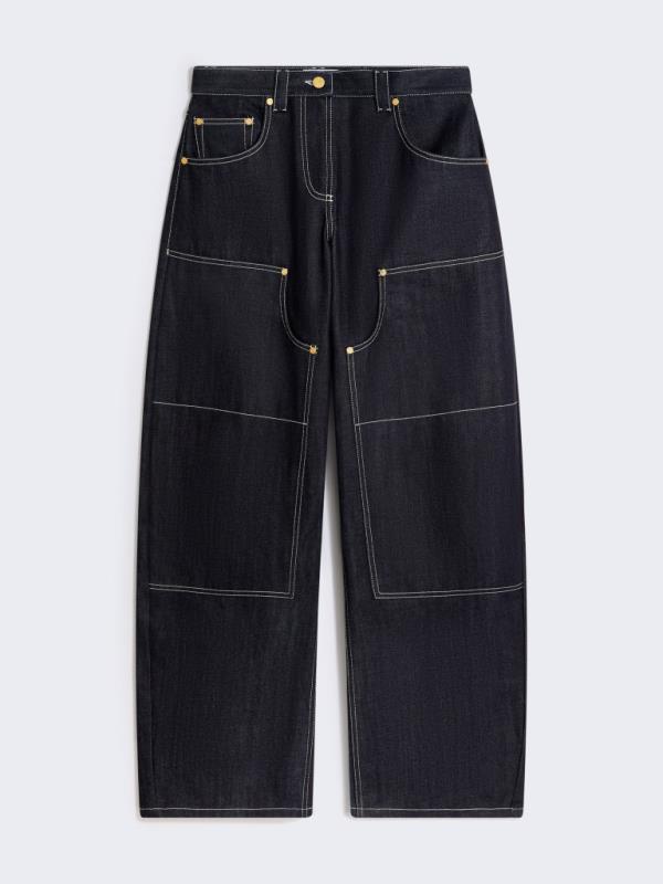 A pair of black denim cowboy pants from Schiaparelli brand