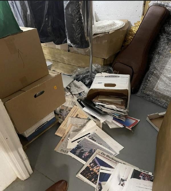 Justice Department photo of alleged classified docs littering the floor after falling from boxes stacked in Mar-a-Lago.