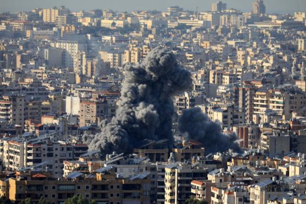 This photo shows the smoke caused by Israeli airstrikes in the southern suburb of Beirut, Lebanon, on Nov. 23, 2024.