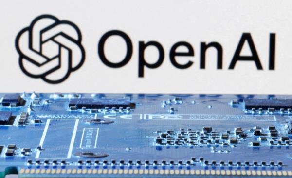 OpenAI logo near computer motherboard.