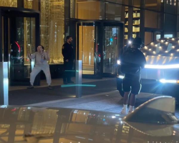 The angry woman is shouts in the direction of Cardi B after the rapper is heard calling to her off camera.