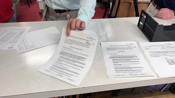 A copy of the search warrant is pictured