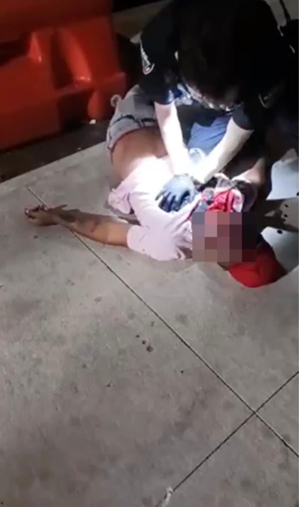 Graphic video still shows a shooting victim.