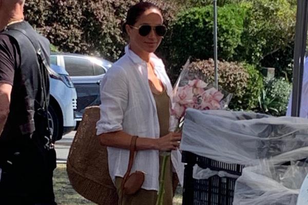 Meghan Markle takes her dog to the Farmer's Market in Montecito.