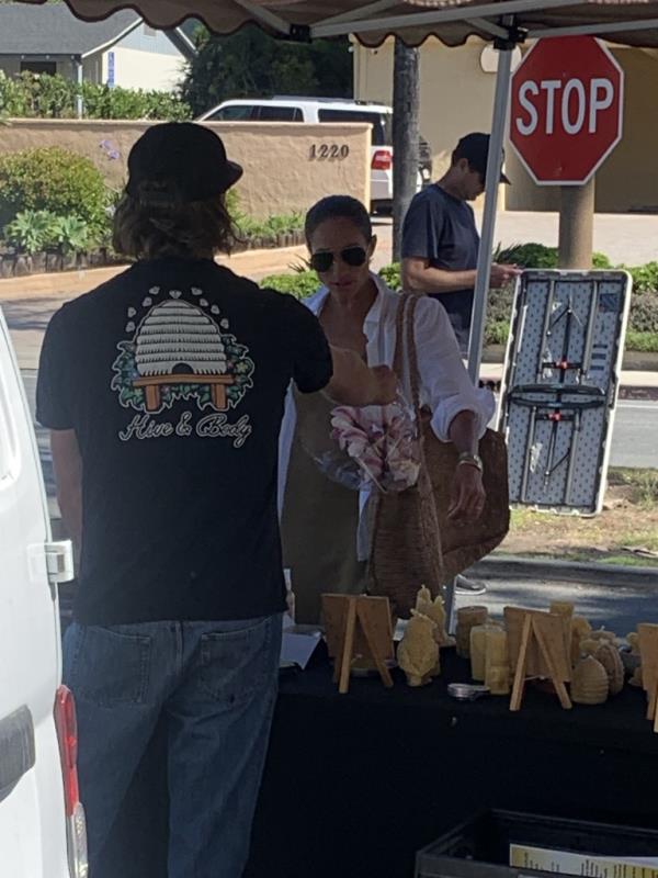Meghan Markle takes her dog to the Farmer's Market in Montecito.