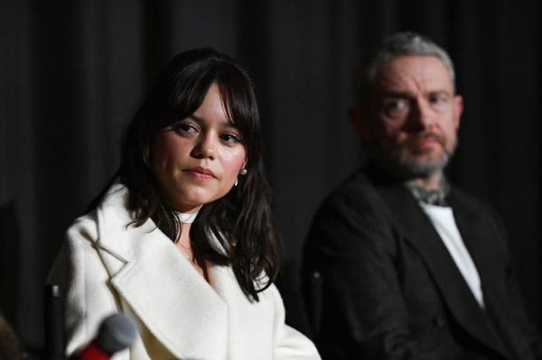 Jenna Ortega and Martin Freeman speak o<em></em>nstage during the screening of 