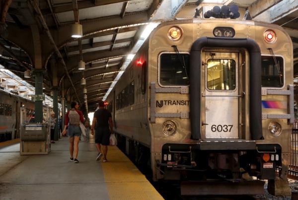 People board a NJ Transit train at the Hoboken Transit Terminal on September 1, 2023, in Hoboken, New Jersey.