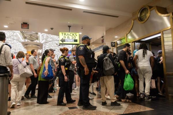 NJ Transit passengers board a train after delays at Penn Station on June 20, 2024 in New York City. 