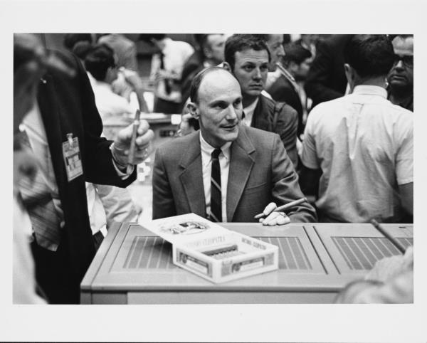 Astro<em></em>naut Thomas Kenneth 'Ken' Mattingly II celebrates the successful rescue of the Apollo 13 spacecraft and crew with a box of cigars at the Mission Co<em></em>ntrol of the Manned Spacecraft Center in Houston, Texas, following the aborted lunar landing mission, 17th April 1970