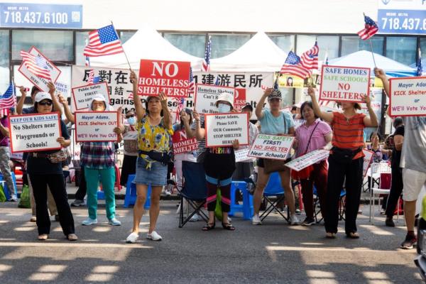 Residents protest in front of the site of a proposed homeless shelter in Benso<em></em>nhurst on Friday, August 16, 2024 Brooklyn, NY
