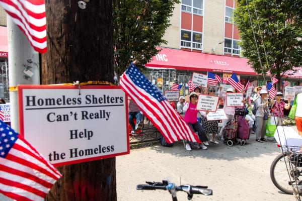 Residents protest in front of the site of a proposed homeless shelter in Benso<em></em>nhurst on Friday, August 16, 2024 Brooklyn, NY