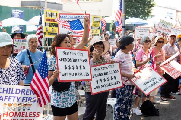 Residents protest in front of the site of a proposed homeless shelter in Benso<em></em>nhurst on Friday, August 16, 2024 Brooklyn, NY