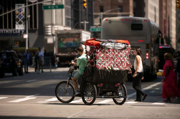 pedicab driver on the go