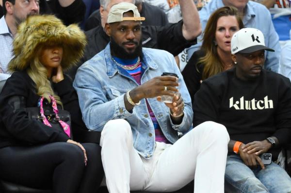 LeBron James (c) and Rich Paul (r) during a 2024 playoffs game.