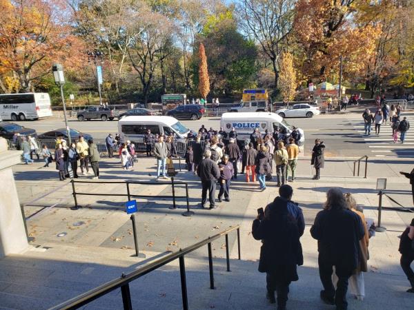 Police vehicles are pictured outside the Museum of Natural History on Sunday.