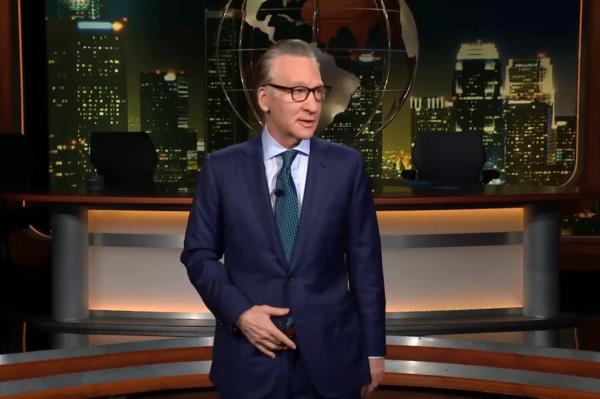 Bill Maher in a suit expressing criticism of Joe Biden's debate performance on his HBO show 'Real Time with Bill Maher'